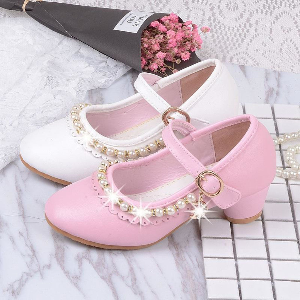 pink high heel shoes with bow